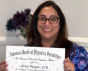 Dr Minal Vazirani holding Board Certification Certificate