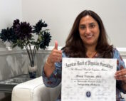 Dr Minal Vazirani holding Board Certification Certificate